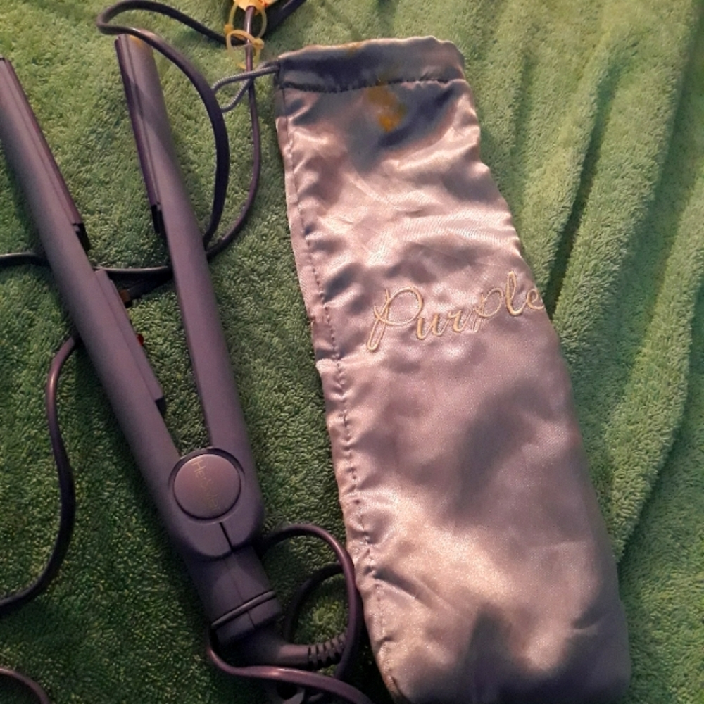 Her styler flat iron hair straighten  Seasonal pack. Comes with silk purple bag